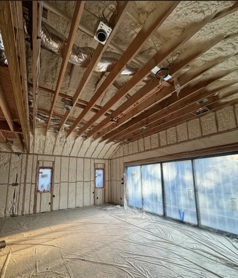 Interior walls and ceiling insulated with spray foam during new construction in Grants